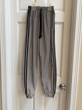 Reflective Gray Track Pants with Black Side Stripes